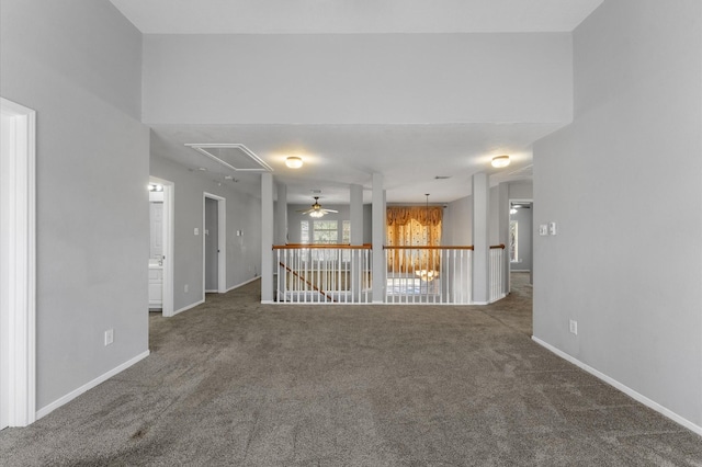 empty room featuring dark colored carpet