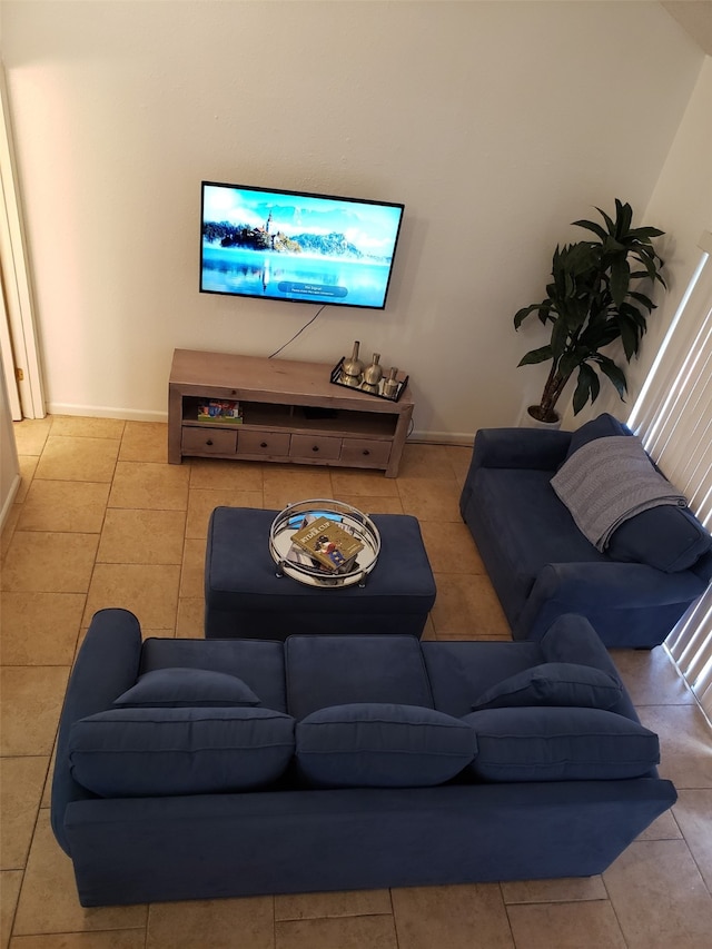 living room with light tile patterned floors