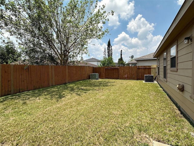 view of yard with central AC unit