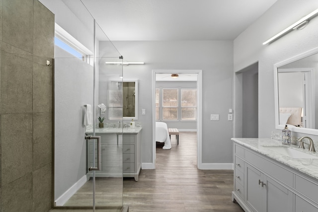 bathroom featuring vanity and hardwood / wood-style floors