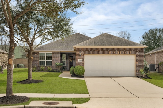 ranch-style home featuring a garage and a front yard