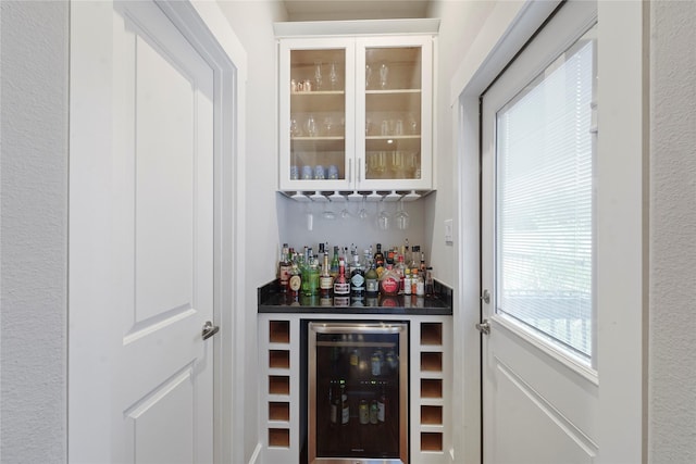 bar featuring beverage cooler