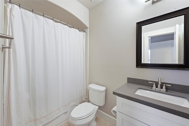 full bathroom featuring vanity, shower / tub combo with curtain, tile patterned floors, and toilet