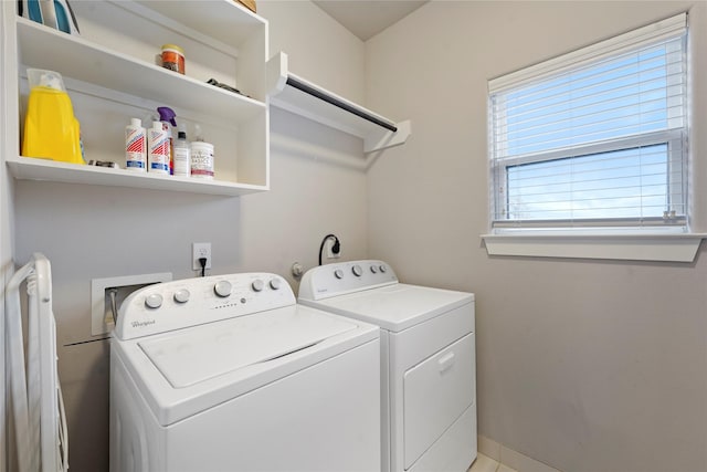 laundry room with independent washer and dryer