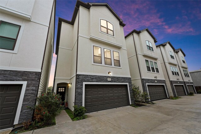 view of property featuring a garage