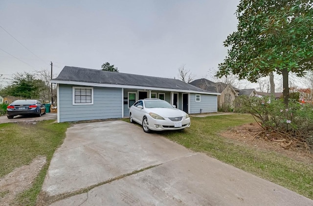 ranch-style house with a front yard