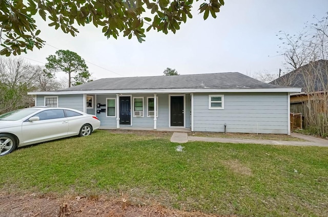 single story home featuring a front lawn and a porch