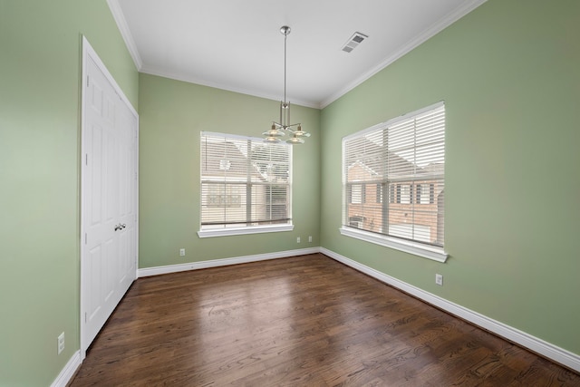 unfurnished dining area featuring dark hardwood / wood-style flooring, a notable chandelier, and ornamental molding