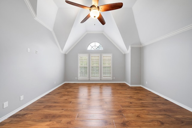 unfurnished room featuring lofted ceiling, dark hardwood / wood-style floors, and ceiling fan