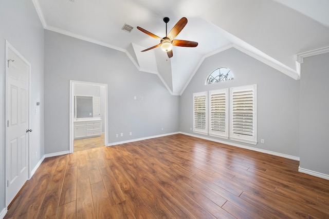 interior space featuring ornamental molding, wood-type flooring, high vaulted ceiling, and ceiling fan