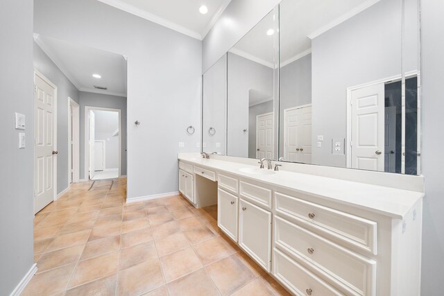 bathroom featuring vanity, tile patterned floors, and ornamental molding