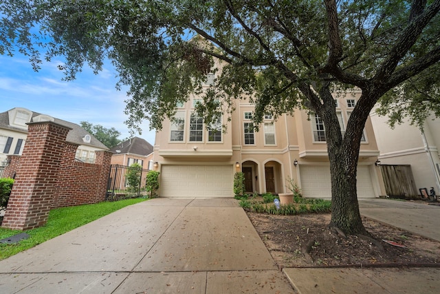 view of front of property featuring a garage