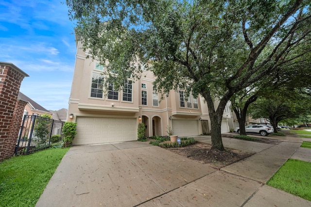 view of front of property with a garage