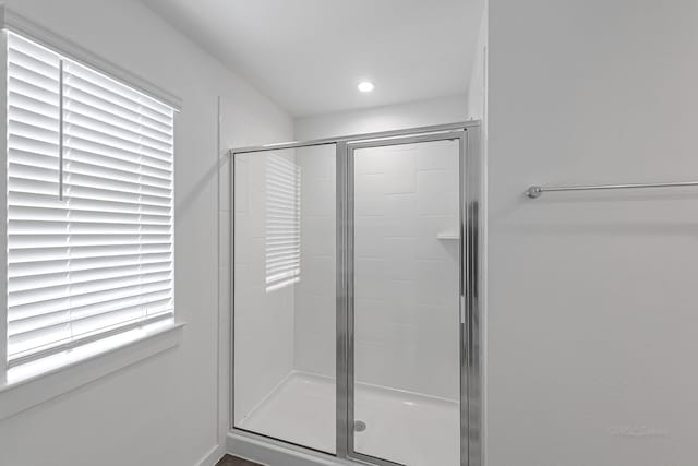 bathroom with an enclosed shower