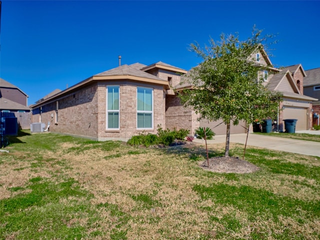 view of front of house featuring central AC and a front yard