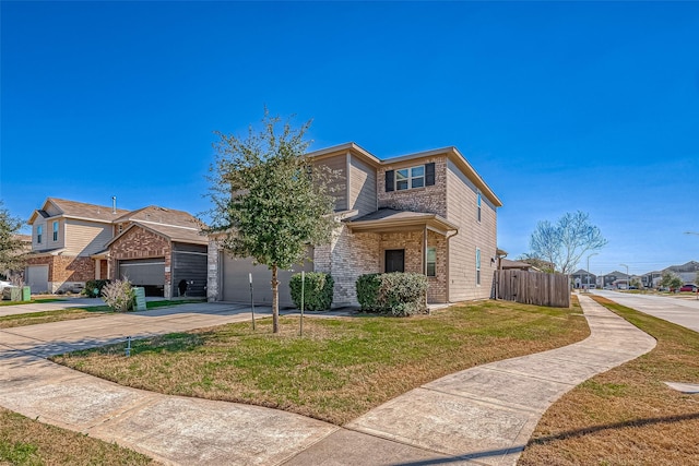 view of front facade with a front lawn, fence, concrete driveway, a garage, and brick siding