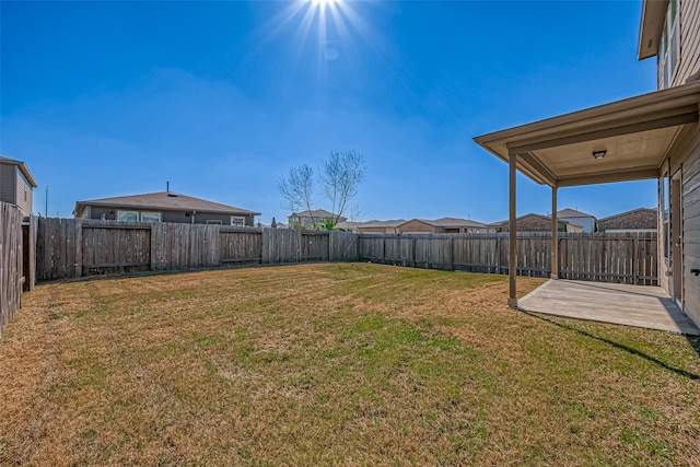 view of yard featuring a fenced backyard