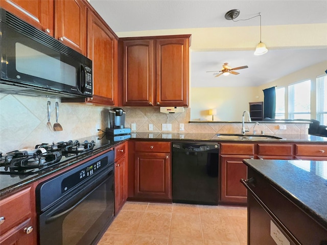 kitchen featuring pendant lighting, sink, ceiling fan, backsplash, and black appliances