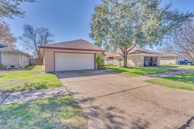 ranch-style home with a garage and a front lawn