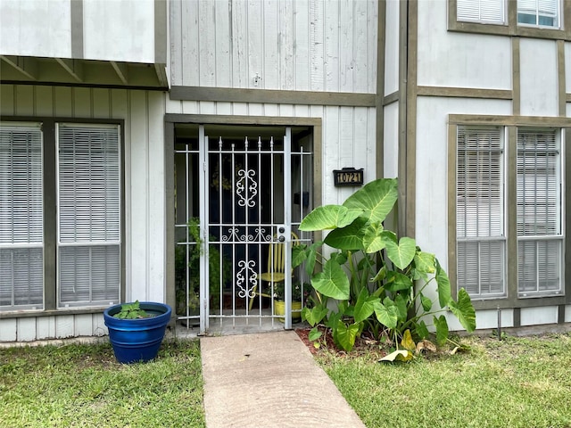 entrance to property featuring central air condition unit