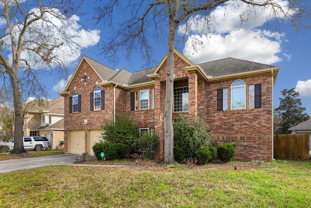 front facade with a garage and a front lawn