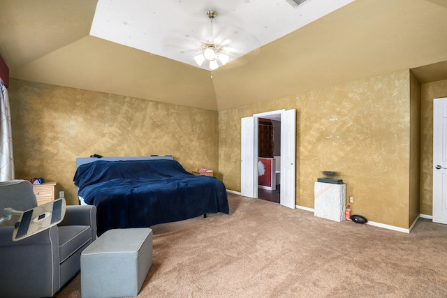 carpeted bedroom featuring vaulted ceiling and ceiling fan