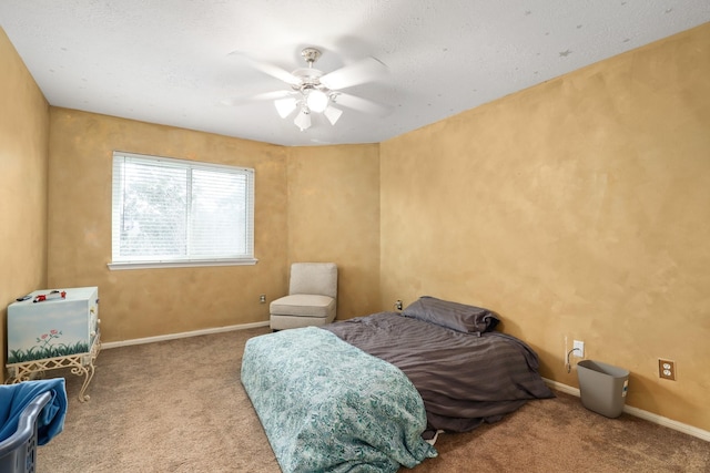 bedroom featuring light colored carpet and ceiling fan