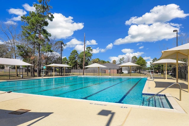 view of swimming pool featuring a gazebo and a patio