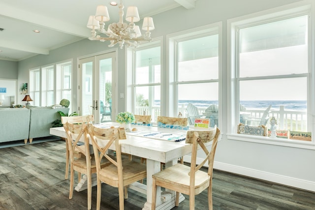 dining space with french doors, ornamental molding, dark hardwood / wood-style flooring, and beamed ceiling