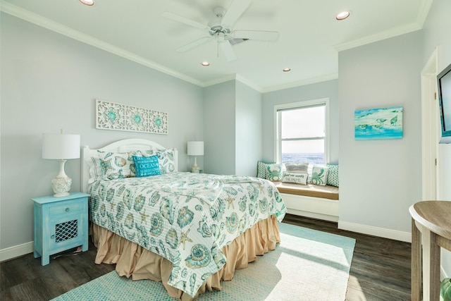 bedroom with crown molding, dark hardwood / wood-style floors, and ceiling fan