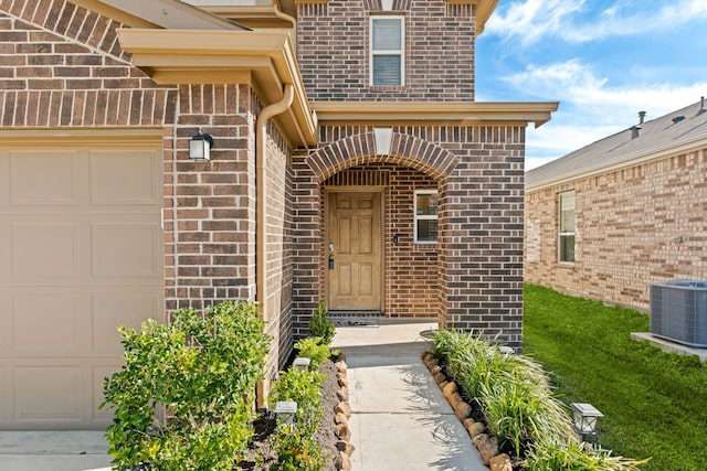 view of exterior entry with central AC