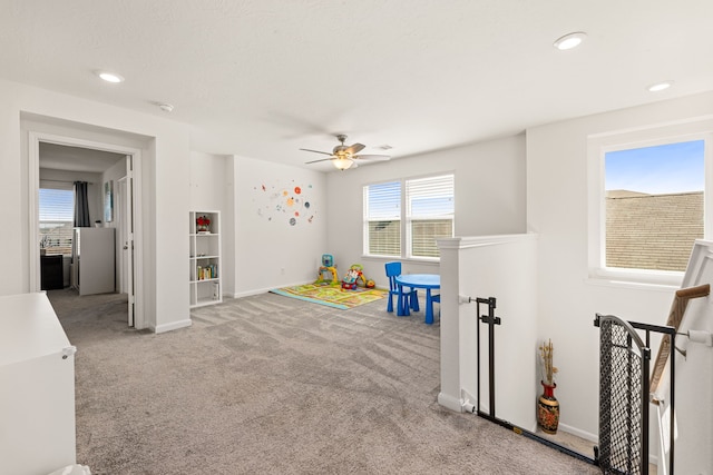 game room featuring ceiling fan and carpet floors