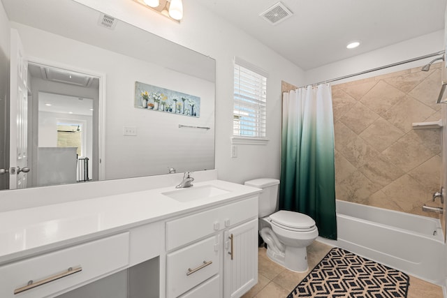 full bathroom with tile patterned flooring, vanity, toilet, and shower / bath combo with shower curtain