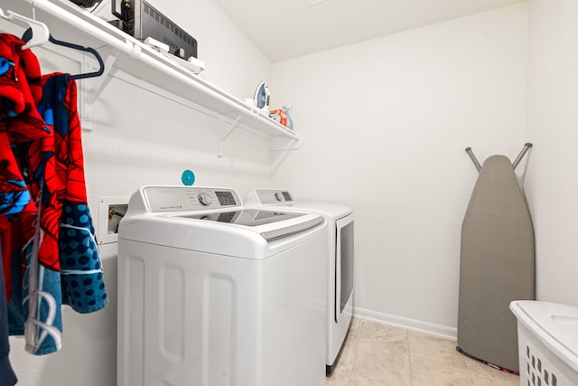 laundry room with washer and dryer