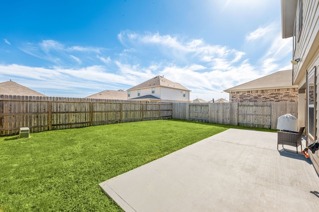 view of yard with a patio area