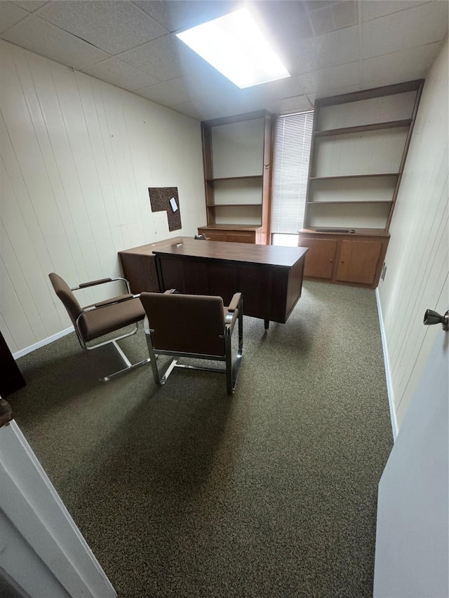 office featuring carpet floors and a paneled ceiling