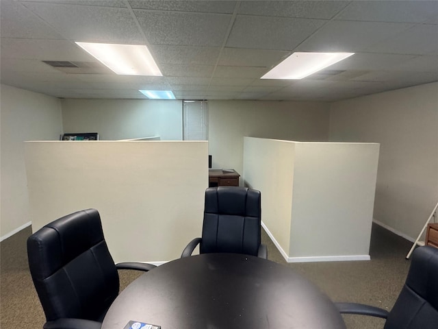 office space featuring carpet and a drop ceiling