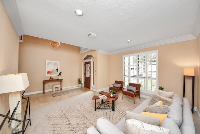 tiled living room featuring crown molding and a textured ceiling