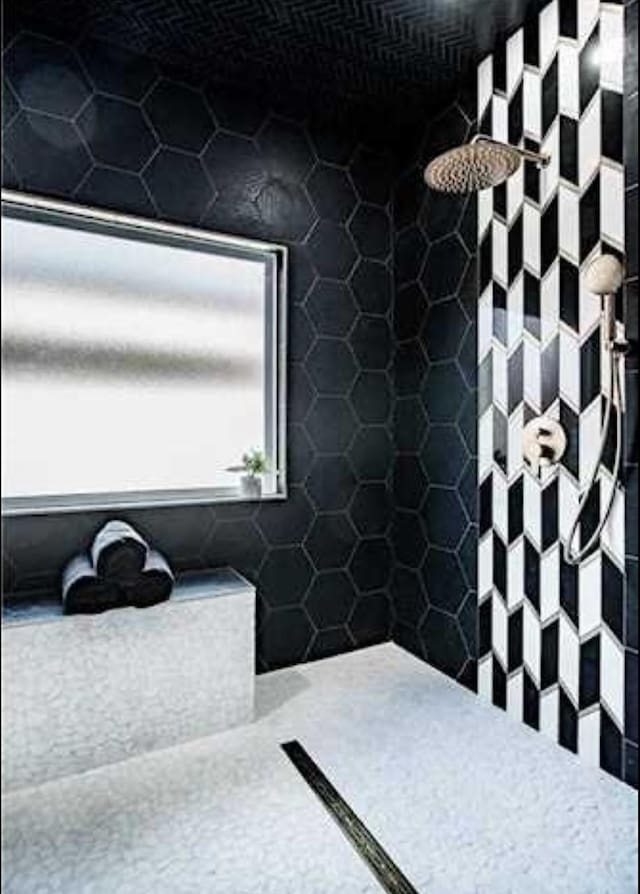 bathroom featuring tiled shower