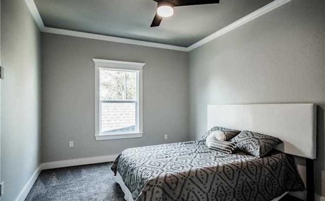 bedroom featuring crown molding, ceiling fan, and carpet