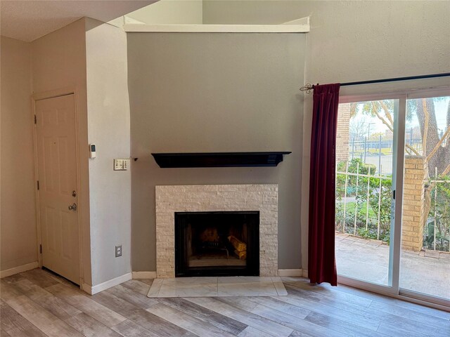 unfurnished living room featuring light hardwood / wood-style flooring