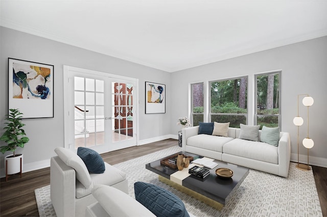 living room with french doors, dark hardwood / wood-style flooring, and crown molding