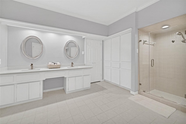 bathroom featuring vanity, tile patterned flooring, crown molding, and walk in shower