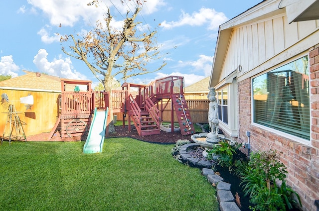 view of yard with a playground