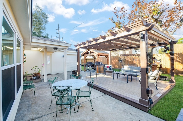 view of patio featuring an outdoor hangout area, a pergola, and a deck