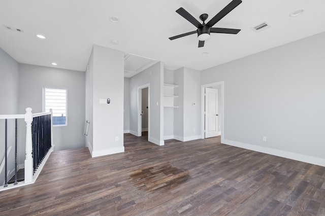 interior space with ceiling fan and dark hardwood / wood-style floors