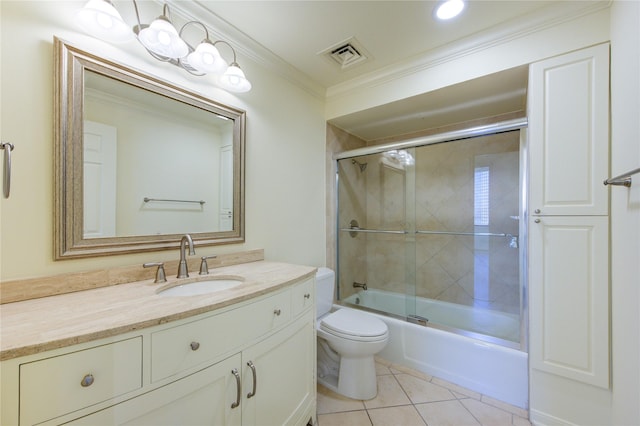 full bathroom with bath / shower combo with glass door, vanity, ornamental molding, tile patterned floors, and toilet