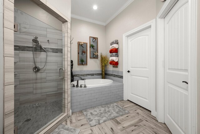 bathroom featuring parquet floors, crown molding, and plus walk in shower