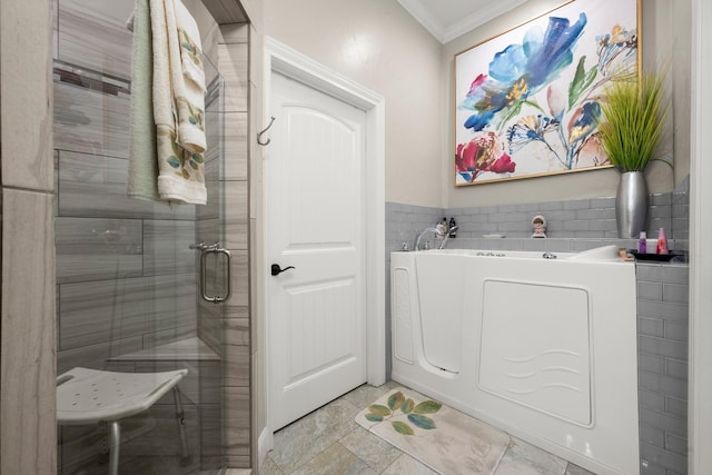 bathroom with crown molding, tile walls, and walk in shower