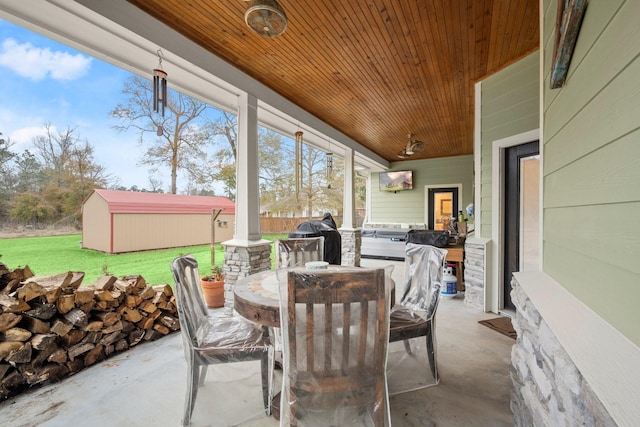 sunroom with wood ceiling